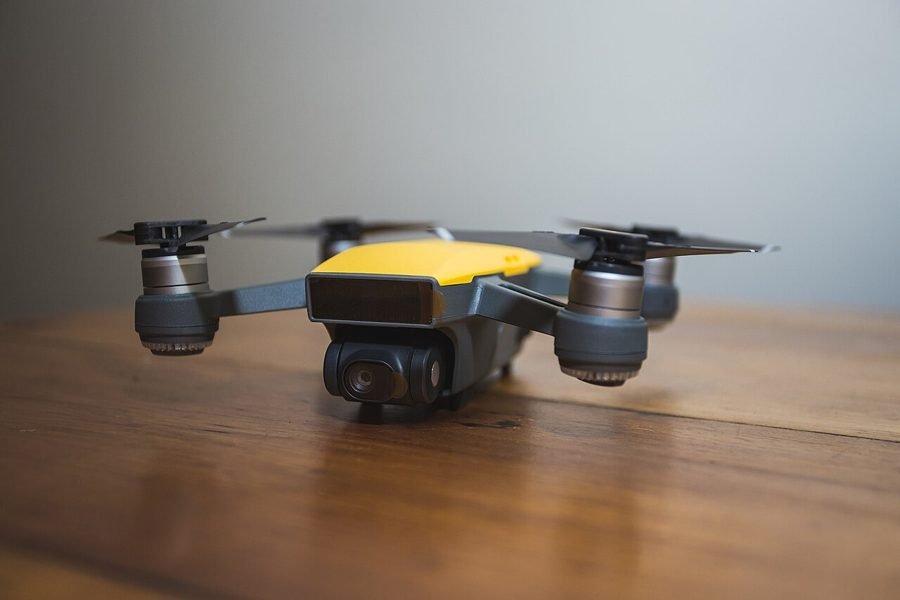 Small quadcopter drone with folding arms and propellers