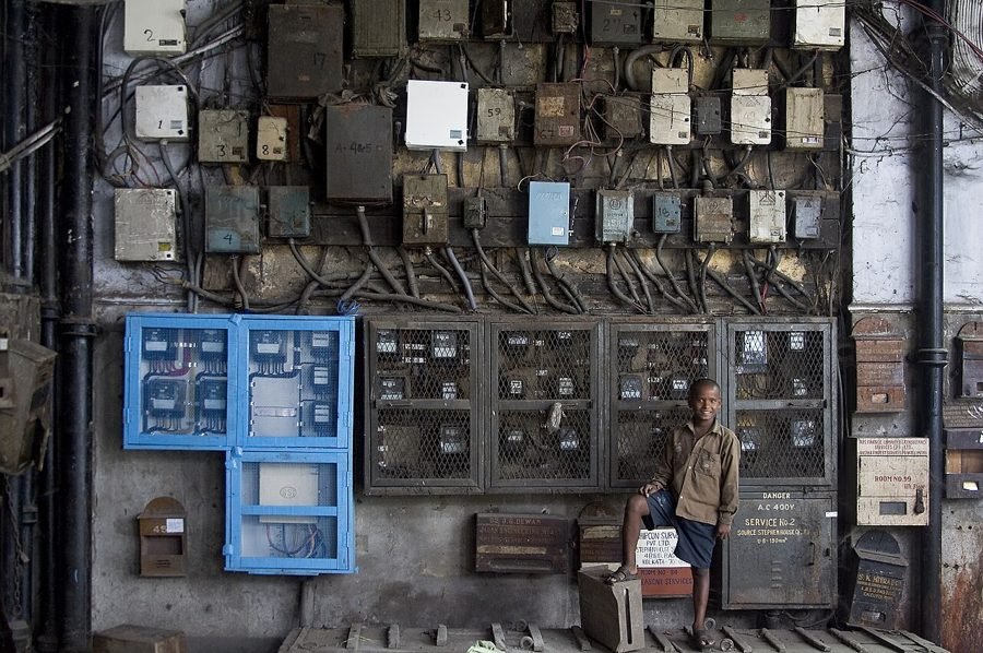 Bank of electricity meters measuring household energy use